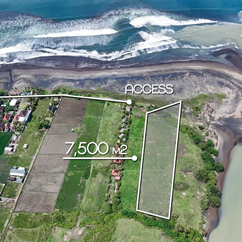 Top-down drone image of a 7,500 m² beachfront land plot in West Bali with marked boundaries, access point, and direct frontage to the ocean